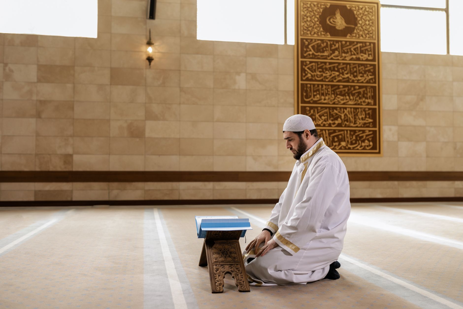 A person reading the Quran to learn about truthfulness in Islam and the life of Prophet Muhammad ﷺ.
