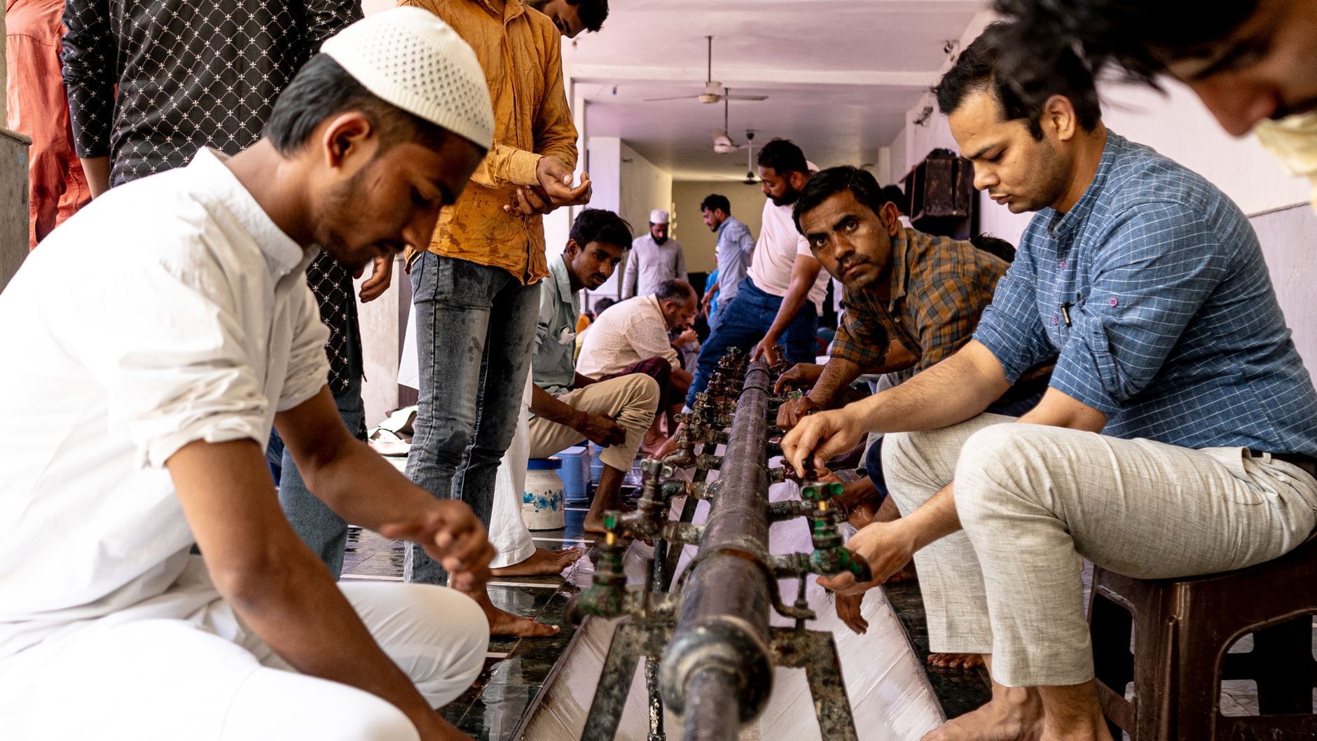 Clear water flowing to represent the Sunnah of Wudu for ritual purification.