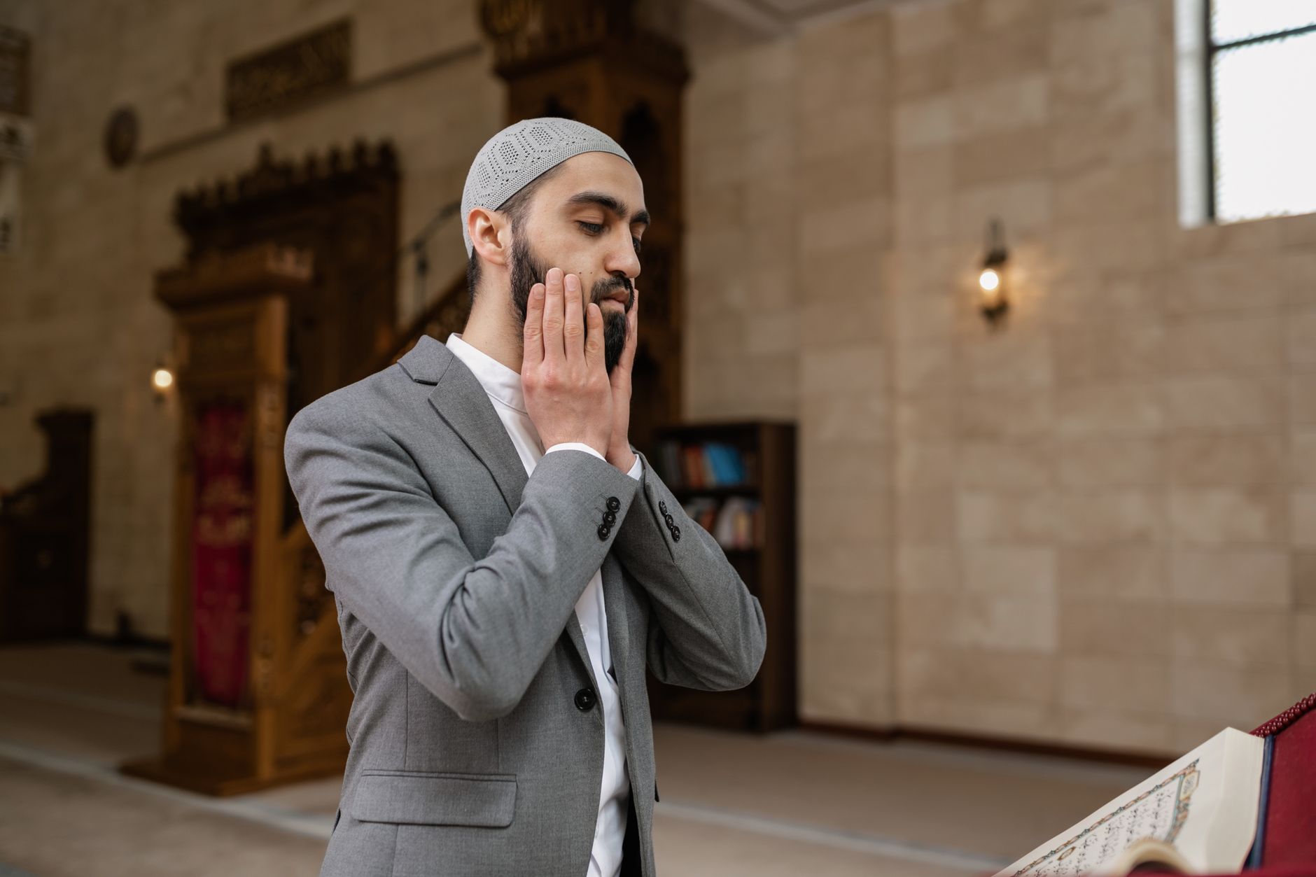 A believer making sincere dua to strengthen Iman in a quiet and peaceful setting.
