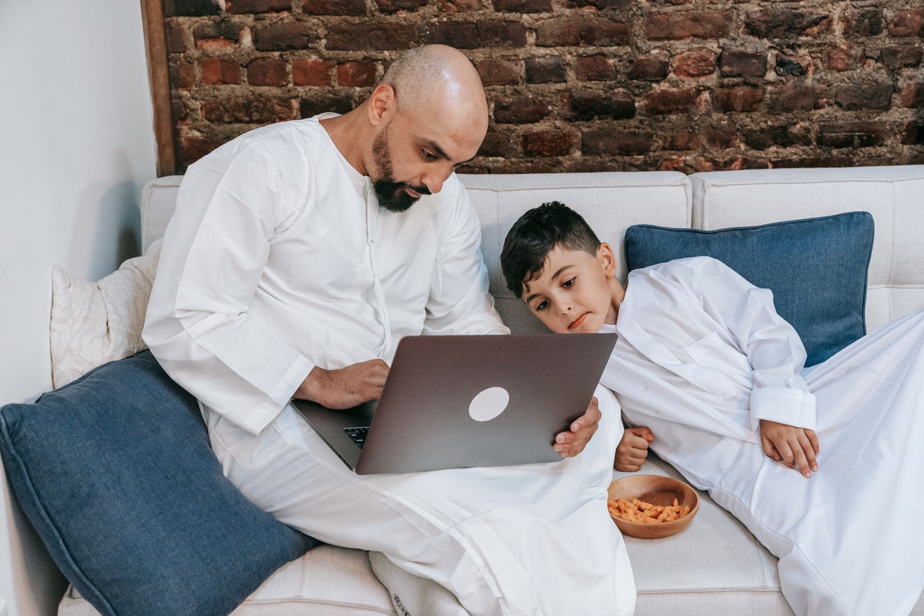 A father and son spending time together, reflecting the rights of children in Islam.