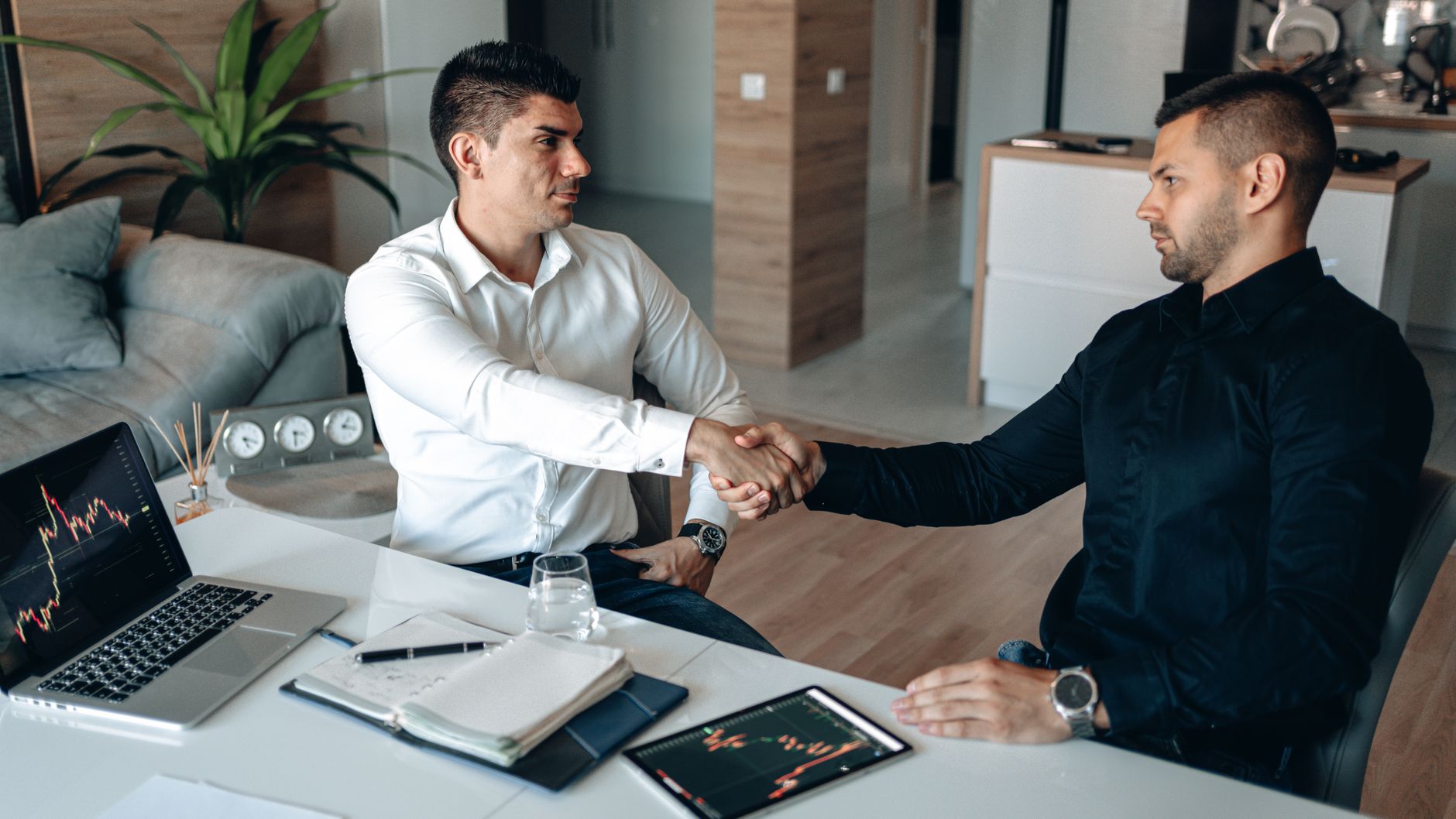 A professional handshake symbolizing trust in a halal business in islam.